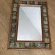 Vintage wall mirror in wood and ceramic tiles