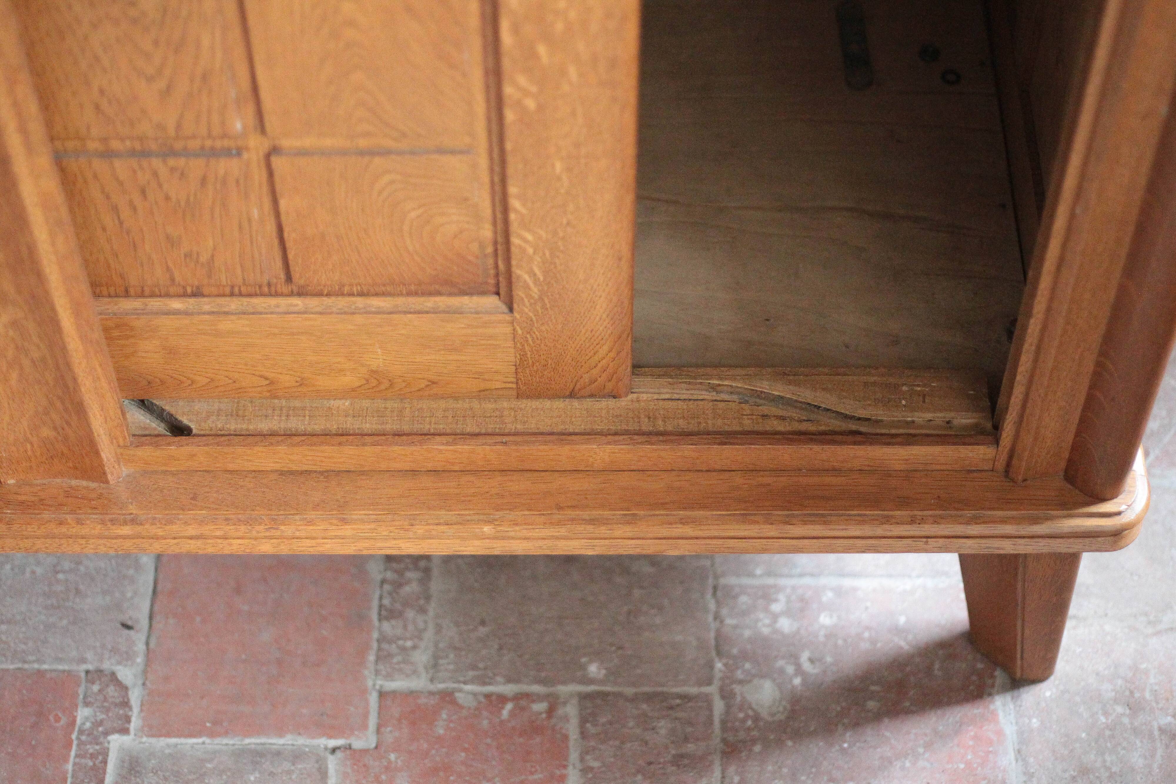 Vintage wooden wardrobe with sliding doors.