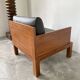 Modernist armchair in exotic wood and leather