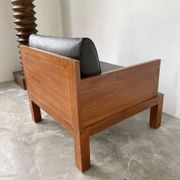 Fauteuil moderniste bois exotique et cuir