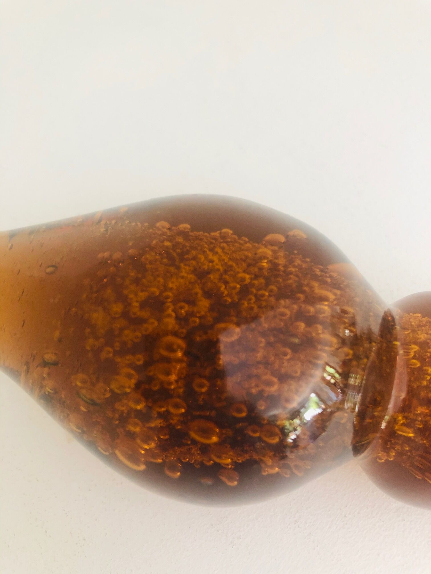 Old carafe in amber and bulled Biot glass, stamp 1496.