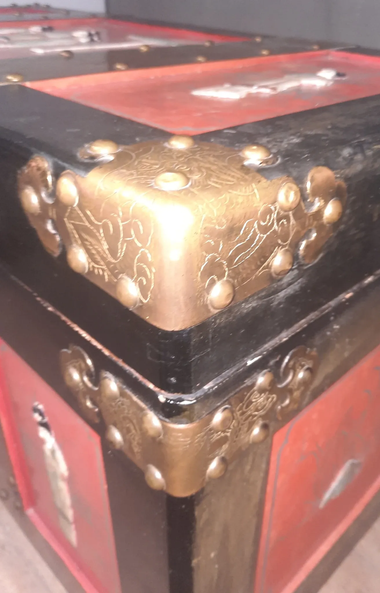 Red lacquered wooden mallet from the Far East.