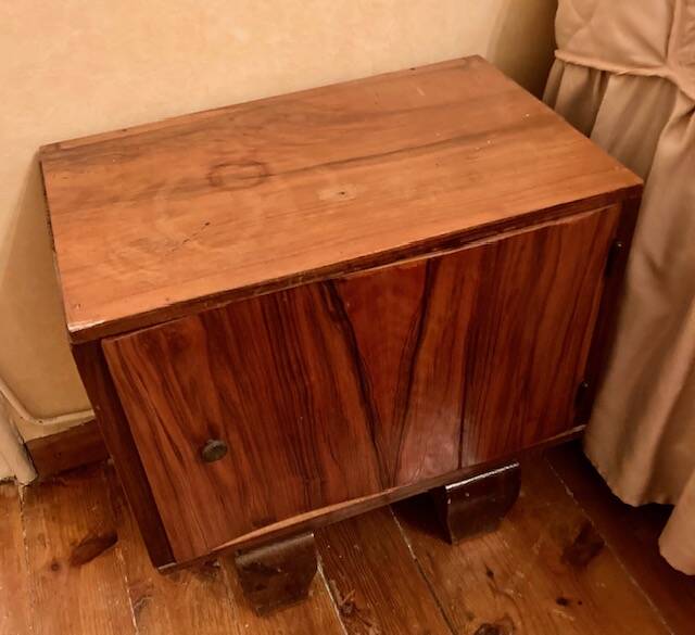 Old black marble chest of drawers