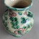 Vase fleuri vert pastel vintage