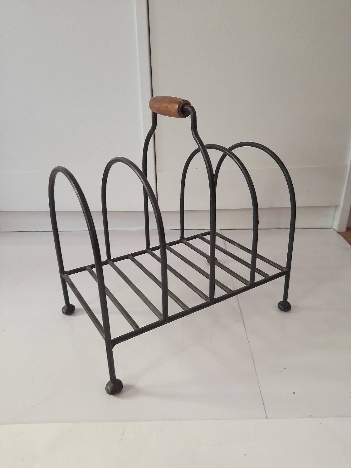 Vintage metal and wood magazine rack