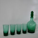 Set of a carafe and 4 designer glasses in green glass from the 70s