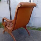Chesterfield armchair in wood and leather