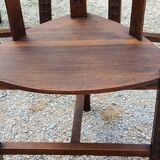 Set of three brutalist tripod armchairs in carved solid oak
