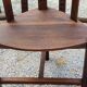 Set of three brutalist tripod armchairs in carved solid oak