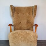 Norwegian sheepskin wing armchair with ottoman 1950