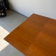 Rectangular extendable dining table with Scandinavian design in teak.