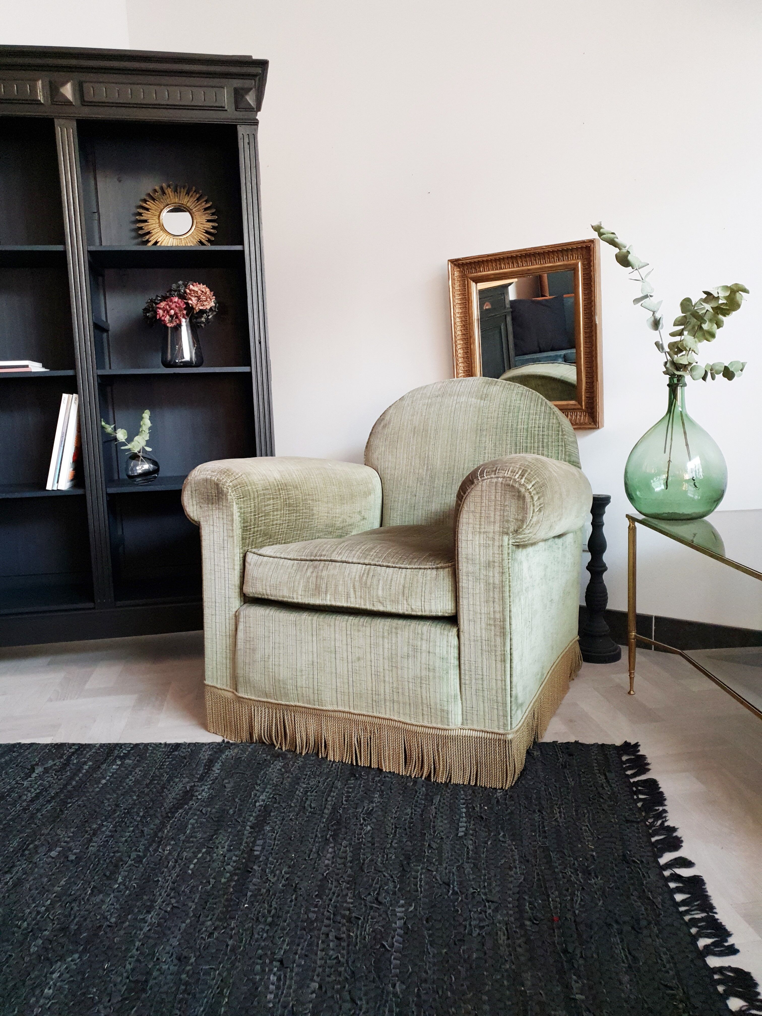 Fringed velvet armchair