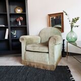 Fringed velvet armchair