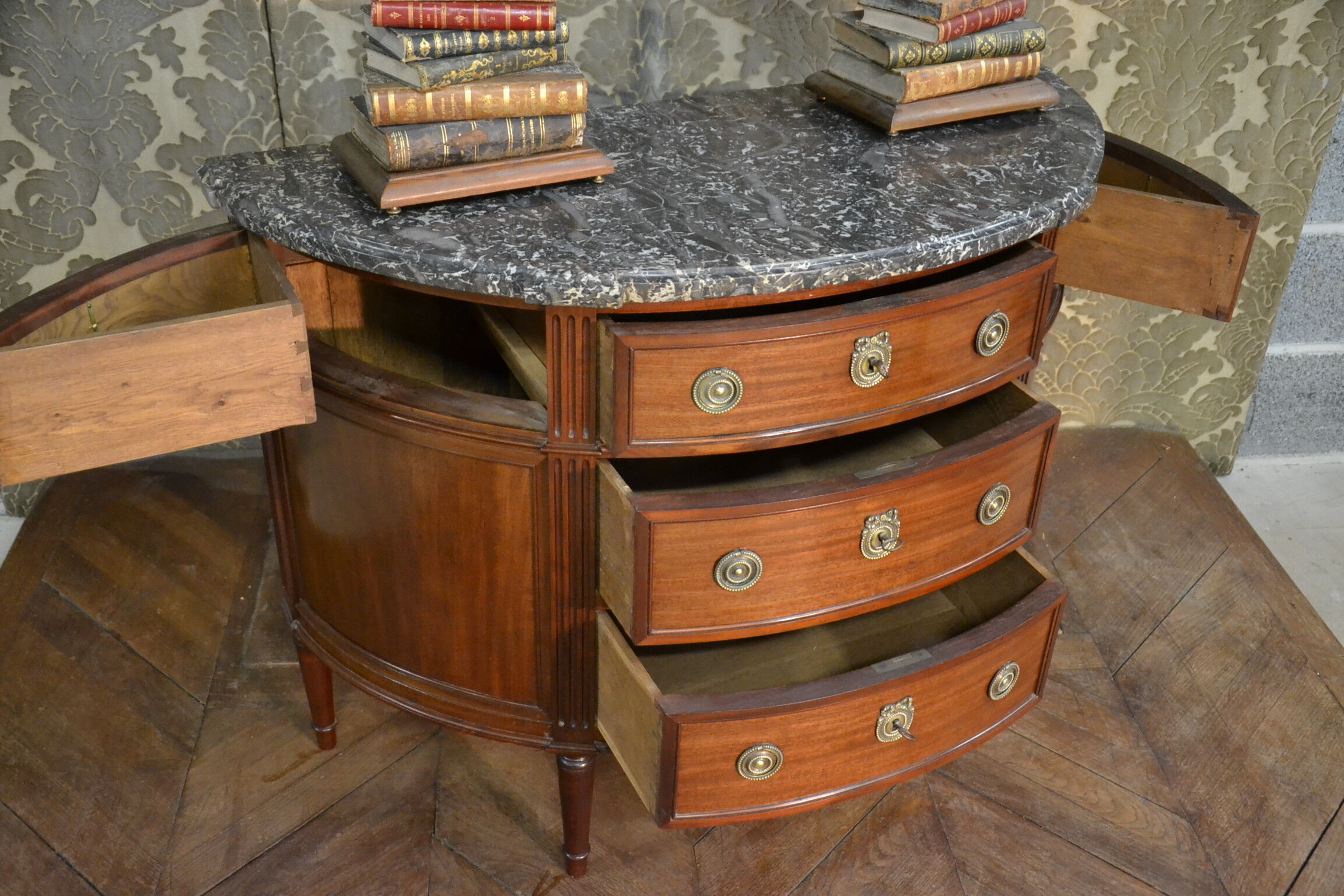 Louis XVI-style half-moon mahogany chest of drawers