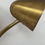 Double orientable vintage patinated brass wall light, Jacques Biny France 1950.