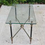 Regency style glass coffee table with crossed legs