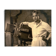 Photograph of an Indian director leaning on his camera