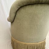 sage green toad armchairs with gold fringe