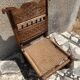 Antique ethnic chair in carved wood
