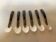 Six antique mother-of-pearl caviar spoons