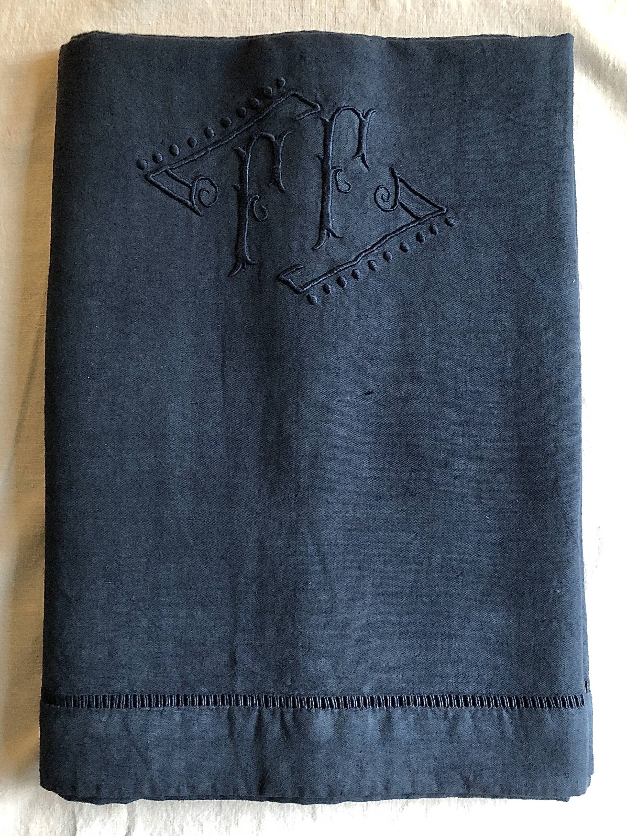 Old linen and cotton sheet dyed in night blue