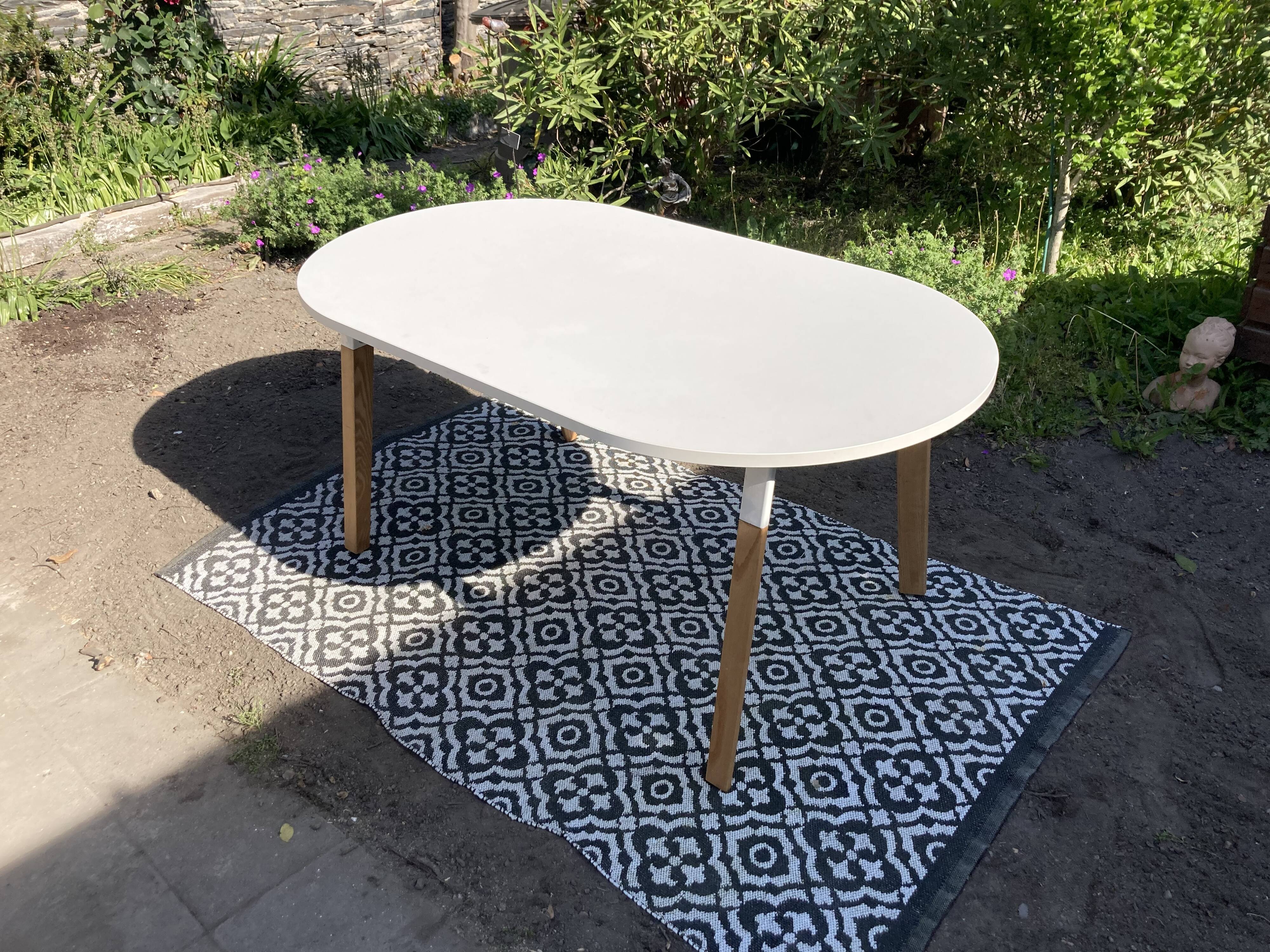 White oval table solid wood base
