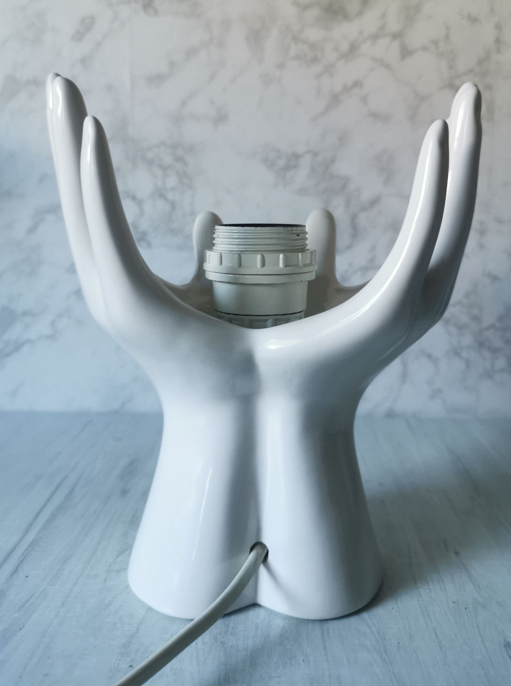 White ceramic hand lamp