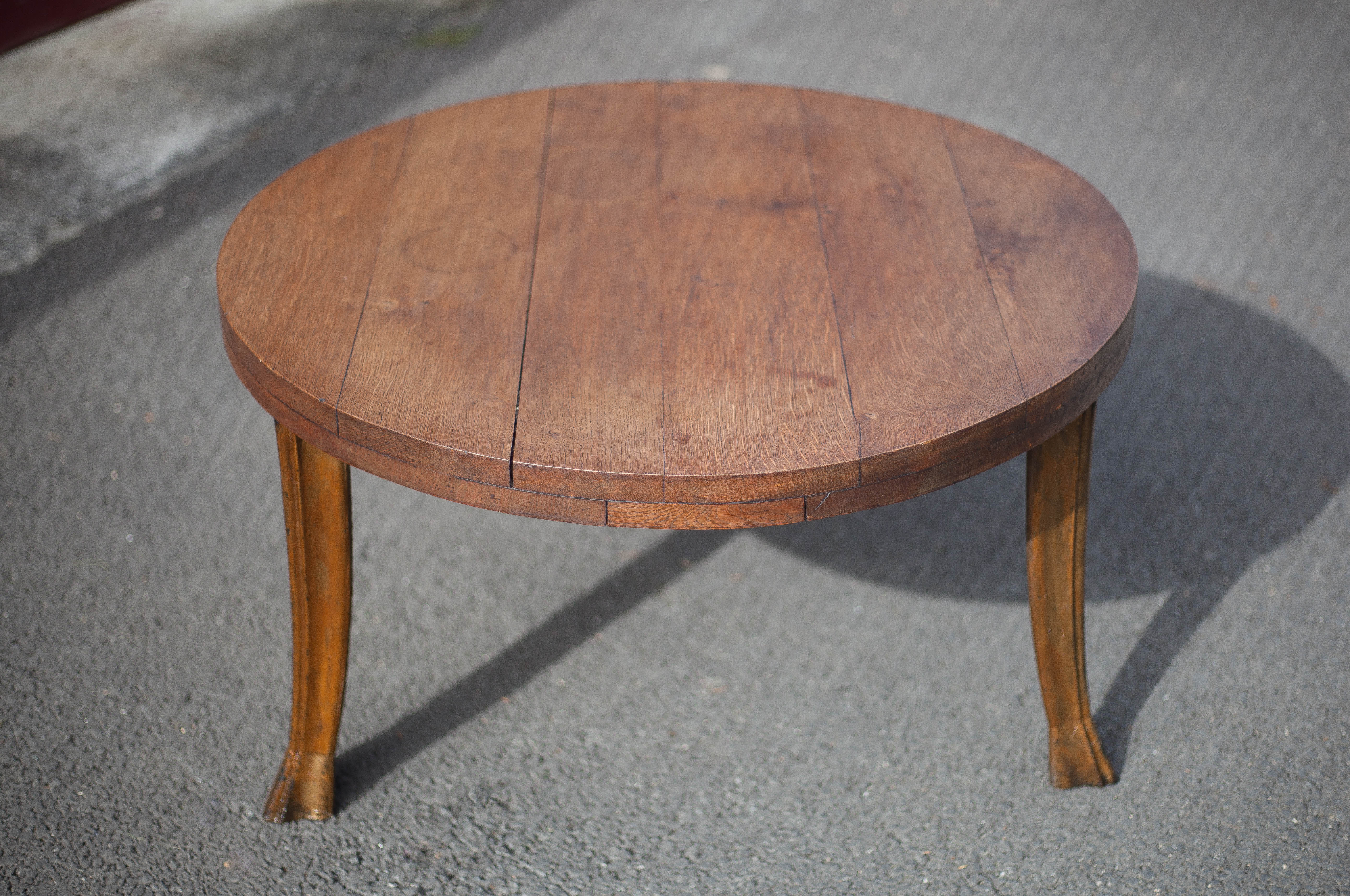 Wooden coffee table with cast iron legs