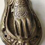 Door knocker in bronze