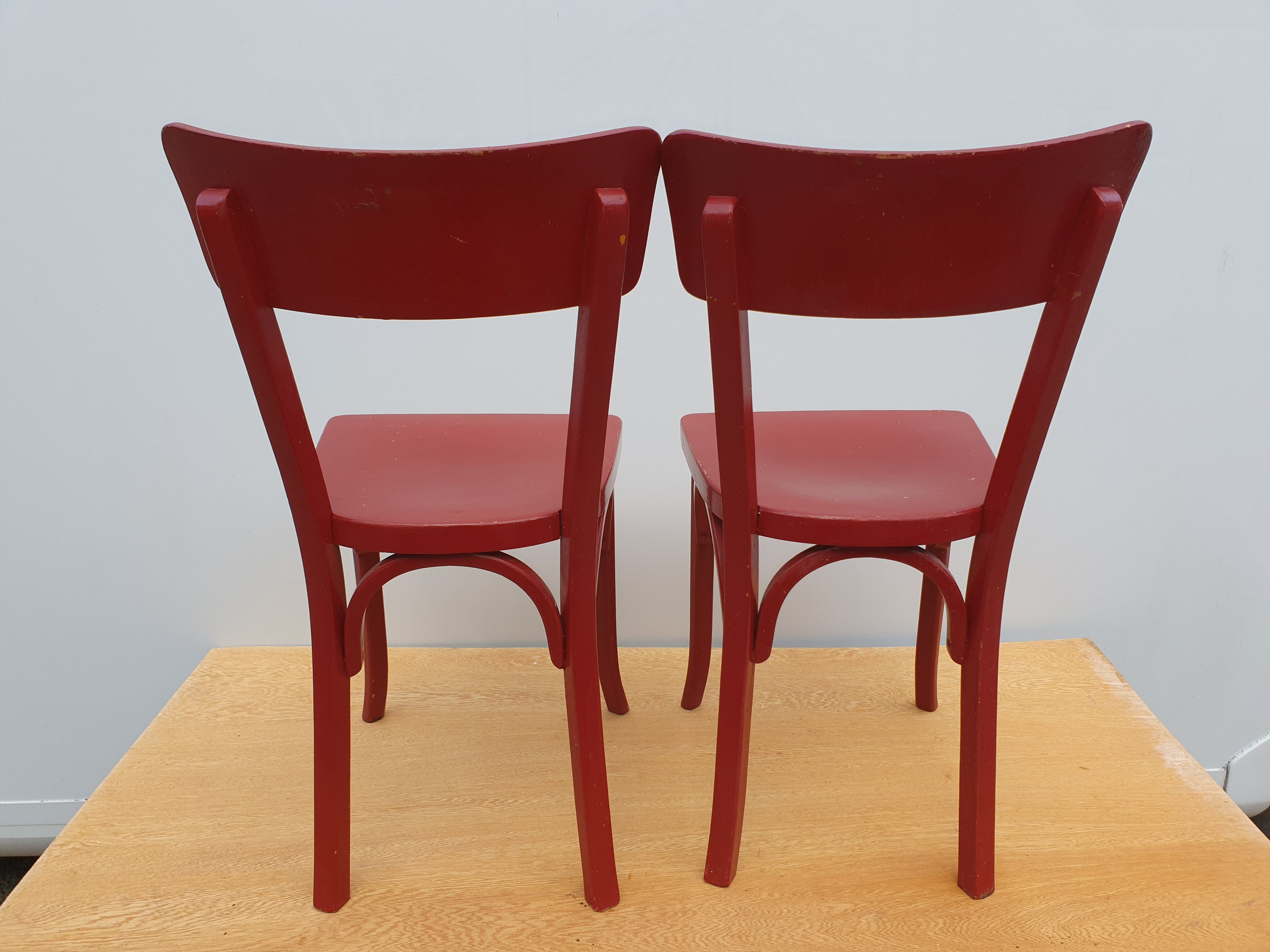 4 red chairs bistro Baumann