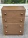 compact 4-drawer chest — Dark wood effect
