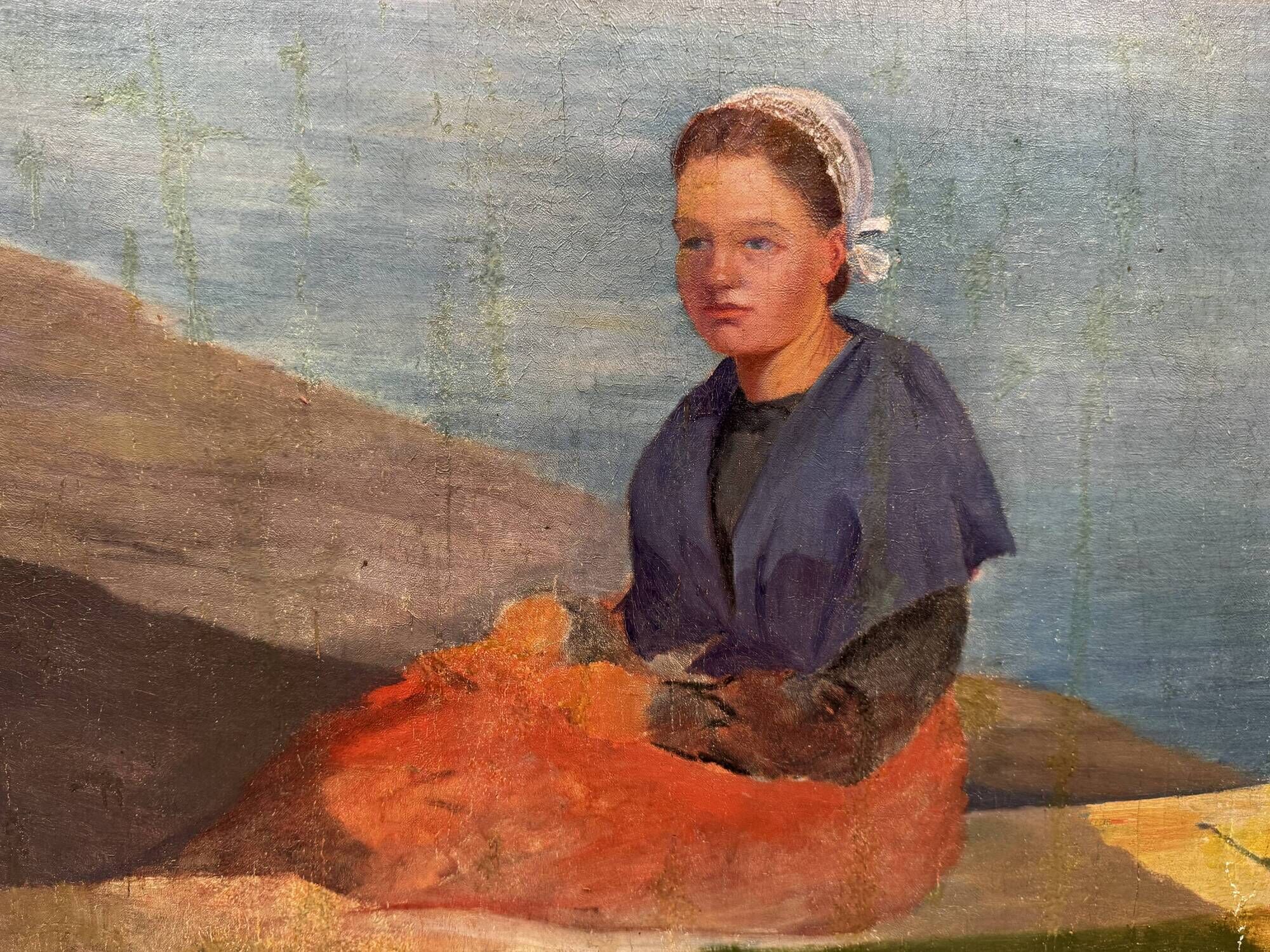 Bretonne au bord de l'eau