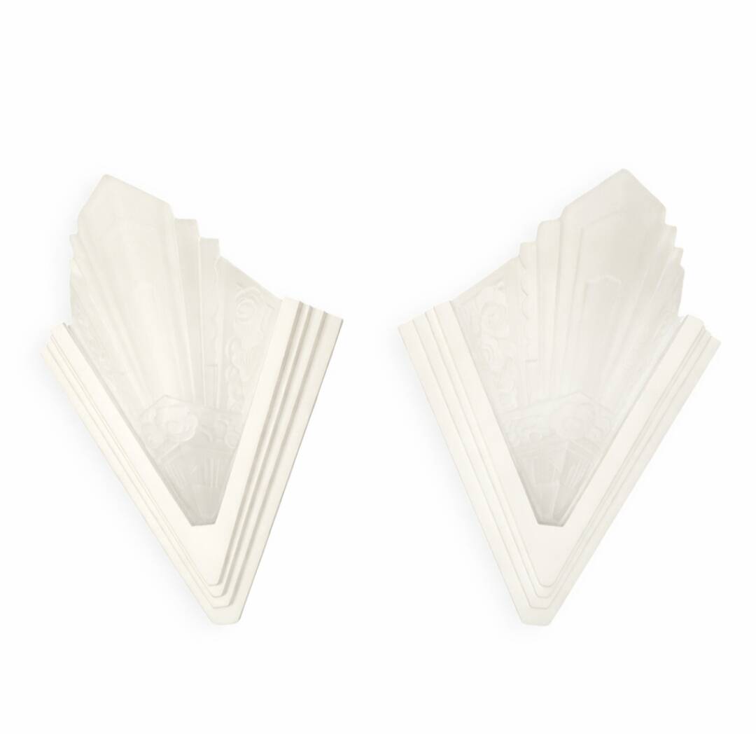 Pair of Art Deco wall sconces in plaster and pressed glass.