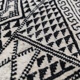 Handwoven black and white rug