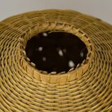 Rattan vase and braided bamboo leaves
