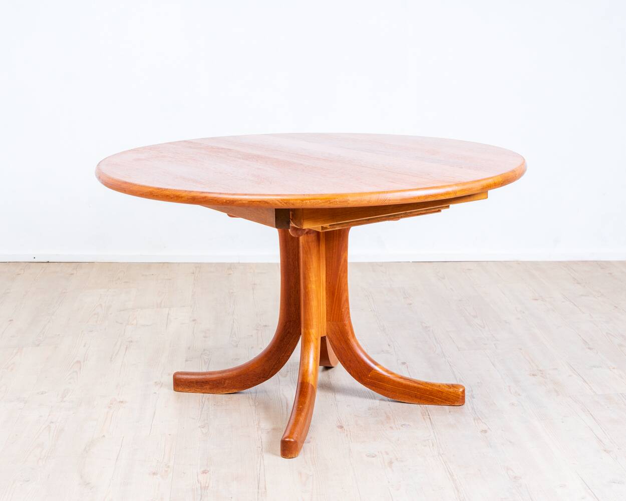 1970s solid teak dining table with Scandinavian design.