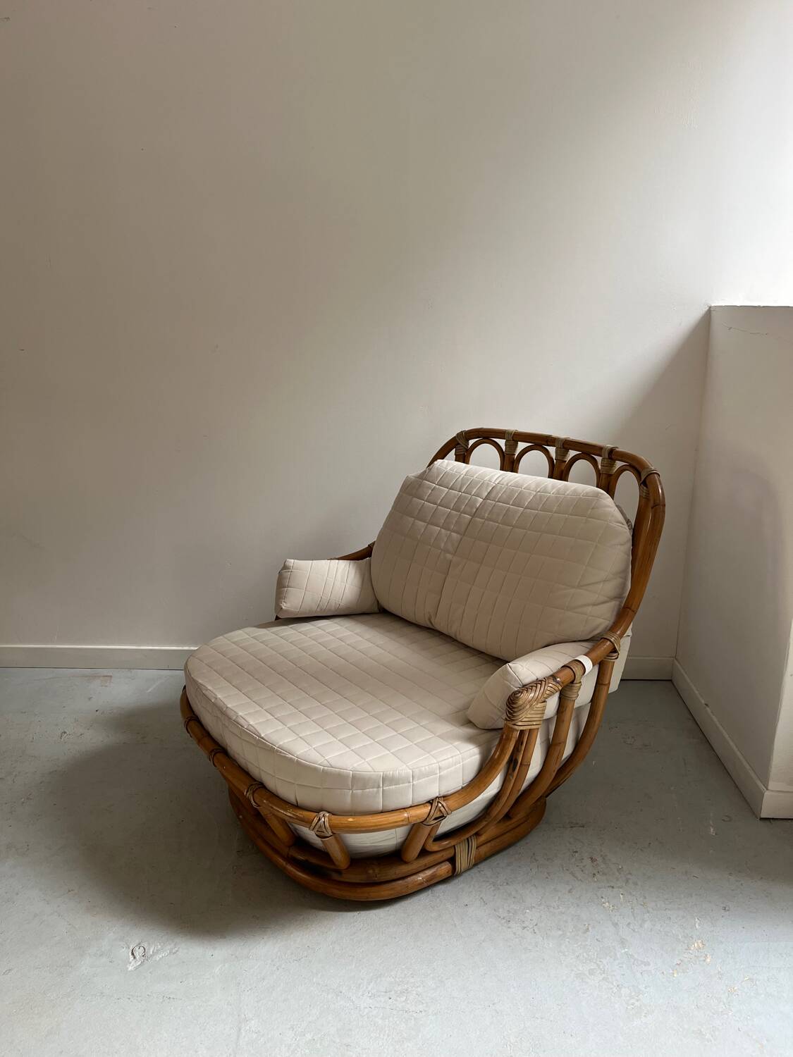 Pair of Roche Bobois rattan armchairs