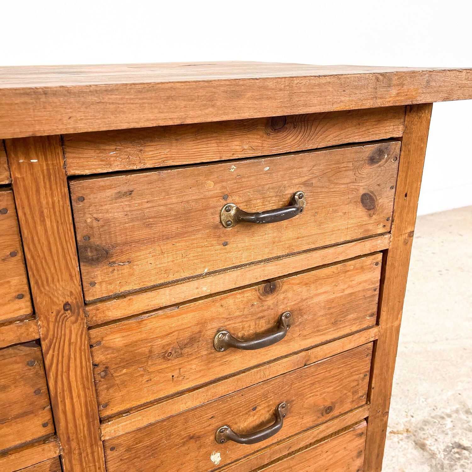 Vintage industrial wooden workbench with drawers