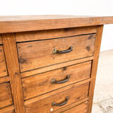 Vintage industrial wooden workbench with drawers