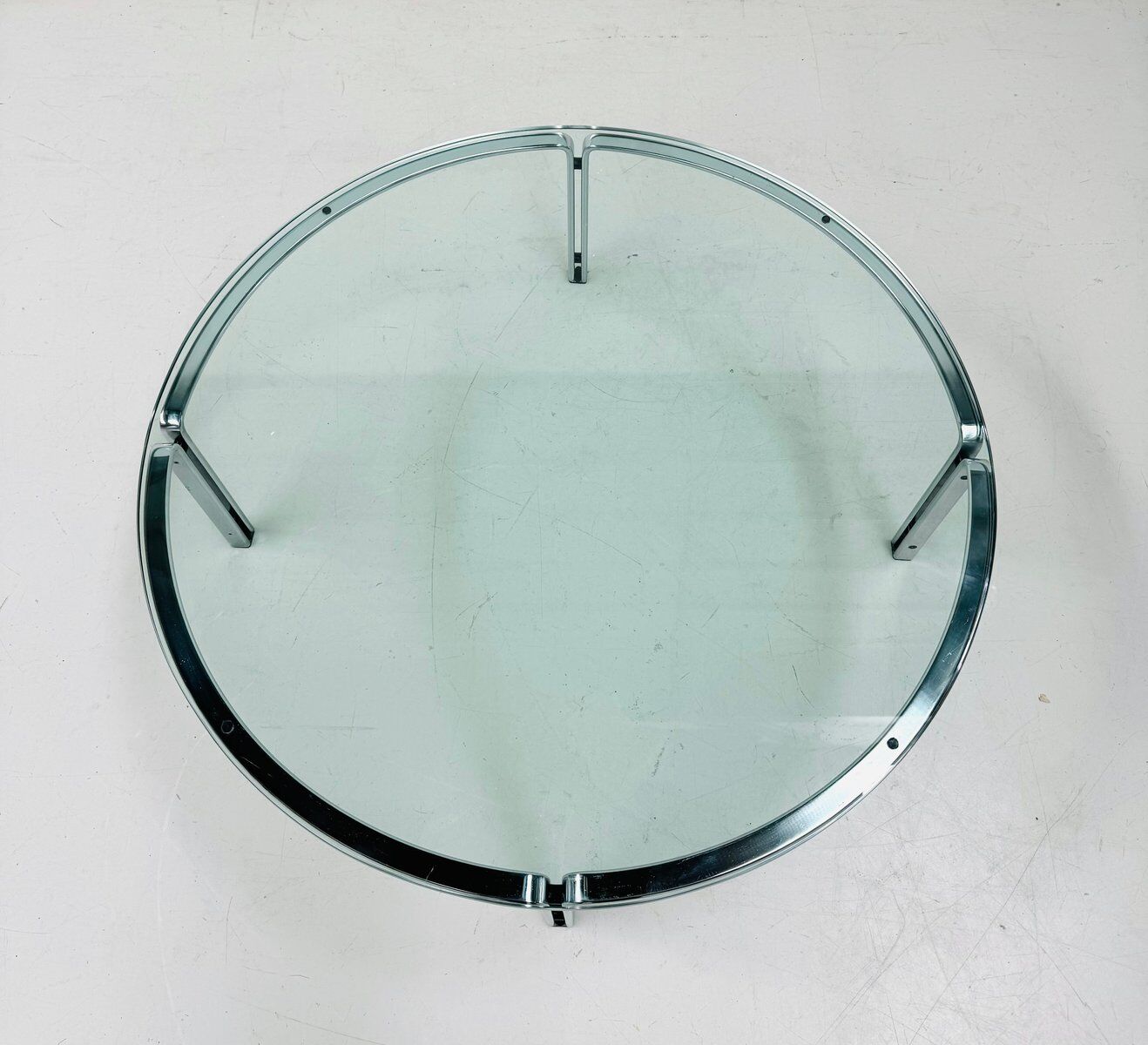 Vintage round glass & steel coffee table by Horst Brüning for Kill International, 1960s