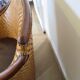 Fauteuil Style Colonial-Rotin tressé-Vintage-coussin simili cuir