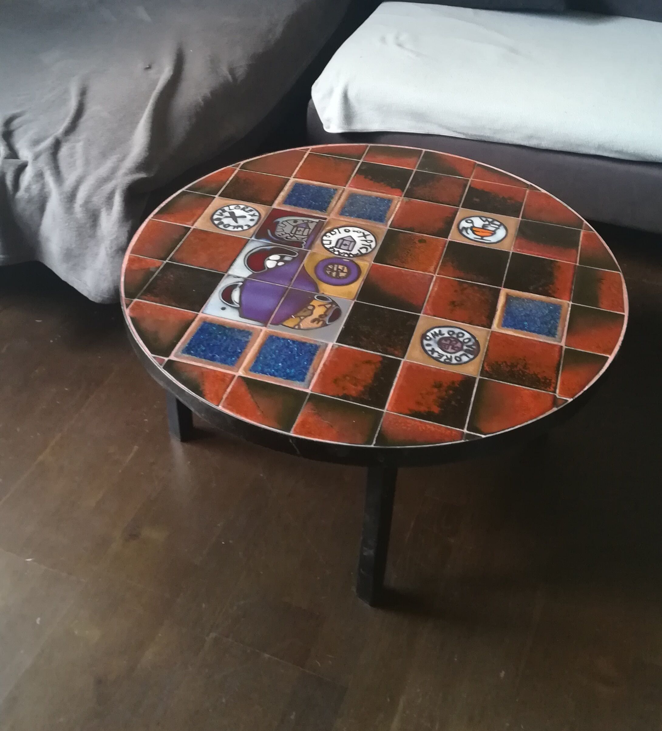 Coffee table, ceramic tray, metal feet, circa 1960