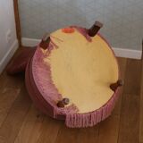 Powder pink fireside chair with fringes