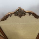 Copper-colored metal fireplace firewall
