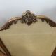 Copper-colored metal fireplace firewall