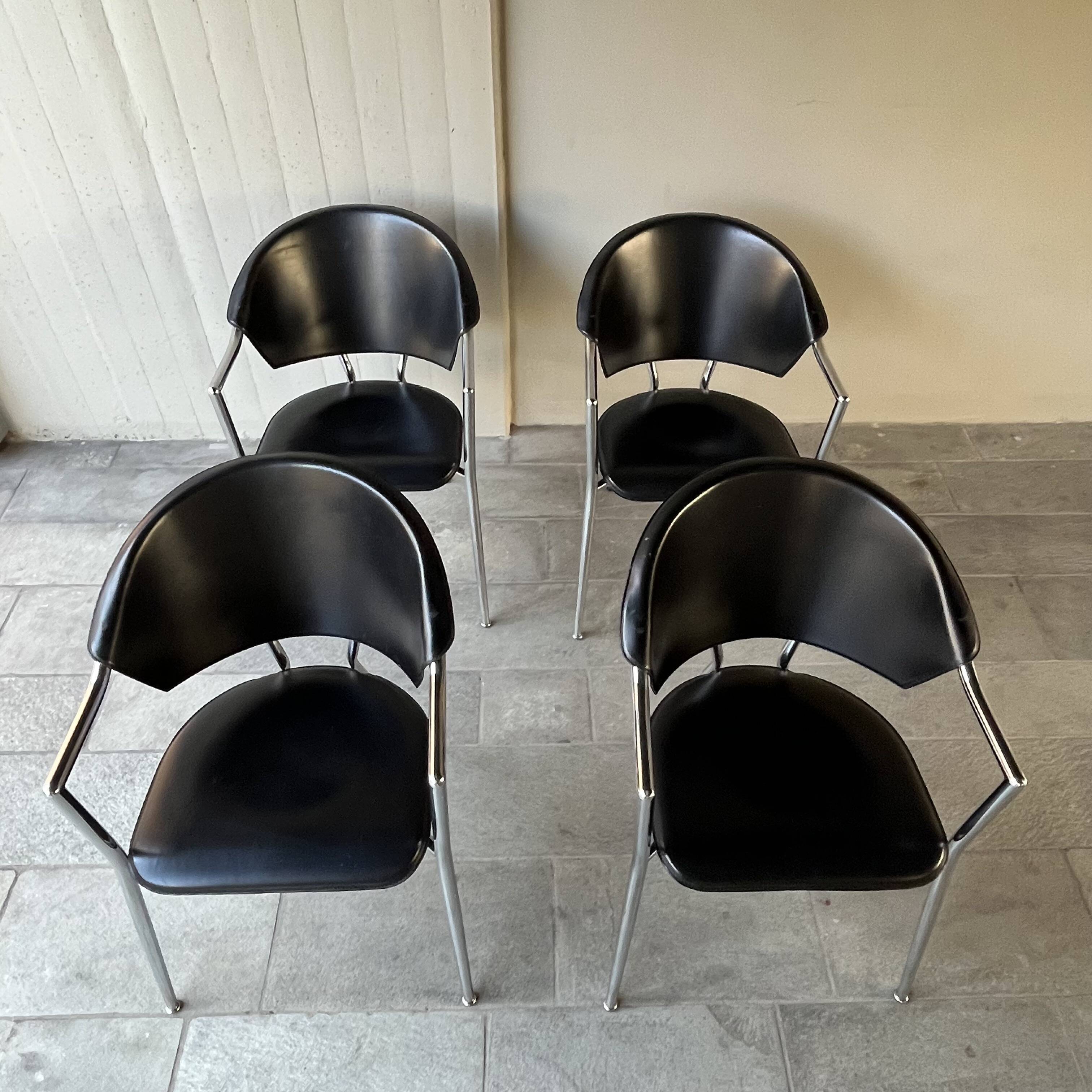 Set of four Italian black leather chairs, 1970