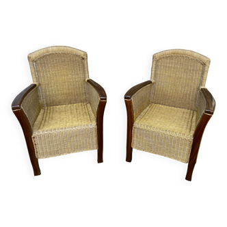 pair of Colonial-style wood and rattan seats