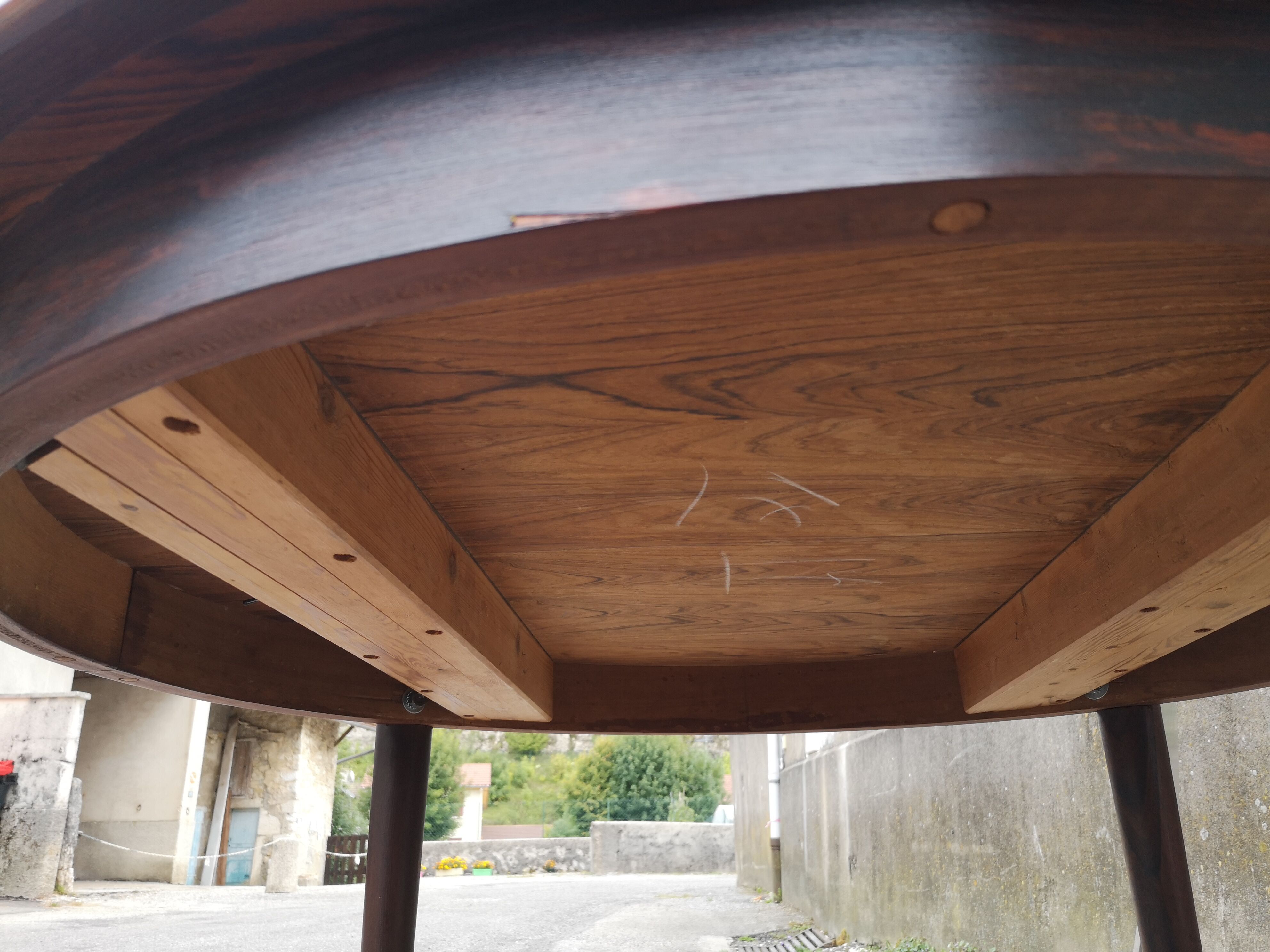 Extended rosewood round table