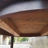 Table ronde en palissandre à rallonges