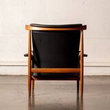 Finished Juhl armchair and its ottoman.